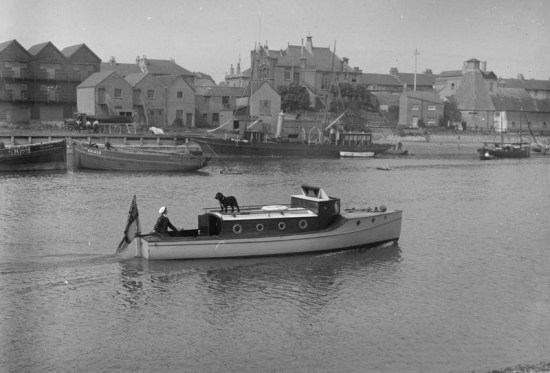 A motor boat crewed by members of the Women's Royal Navy Service